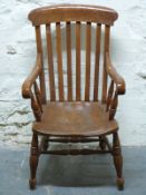 An elm seated Windsor armchair