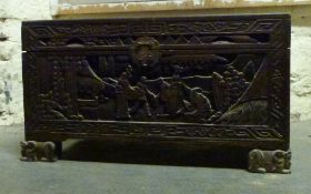 A carved Eastern chest with camphor wood lining,