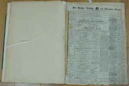 A large bound book of The Dursley,