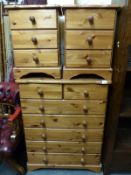A pine chest of two over five straight drawers,