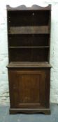 A 19thC oak bookcase with cupboard under with adjustable shelving,