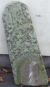 A carved natural stone marker or milepost with number 16 carved to top (approximate H90 x W29 x