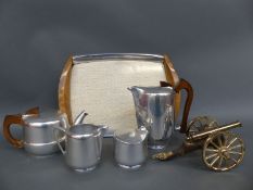 Picquot ware retro teaset and a brass and wood table cannon