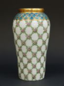 Legras glass vase enamelled with floral garlands and gilt scales over an opal ground, 15.5cm tall.