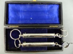 A cased pair of Salter spring balance scales on base 0-16oz and 0-15lb