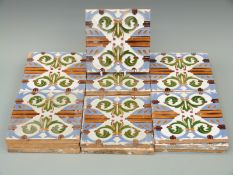 Eighteen Victorian tiles decorated in the Aesthetic/ Art Nouveau style