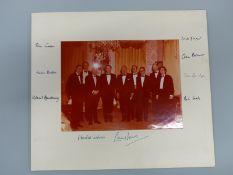 A mounted photograph signed by two Prime Ministers,