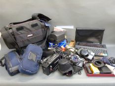 A quantity of cameras to include Pentax ME Super SLR with 1:17mm lens, Sony Handycam,