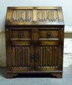 An oak Old Charm style bureau,