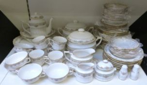 A Noritake English Flowers pattern dinner and tea service, six place settings with extras,