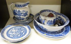 A blue and white Willow pattern jug and bowl,