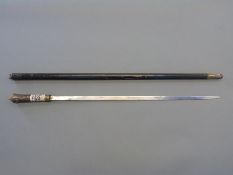 Indian sword stick with horn handle and brass lion mask knop,