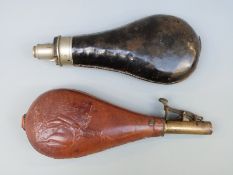 Two powder flasks one G & J W Hawksley with leather cover over metal body (20.