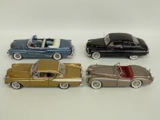 Four Danbury and Franklin Mint diecast model cars comprising The 1949 Jaguar XK120,