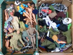 A large collection of Action Man figures and accessories.