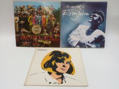 Approximately 200 albums of mixed genres,