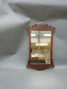 A 19thC fretwork mirror,