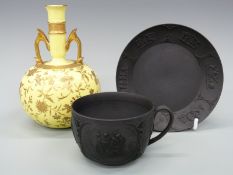 A 19thC Wedgwood black basalt cup and saucer together with a Minton twin-handled bulbous vase with