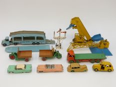 Eleven Dinky Toys diecast model vehicles and accessories including Supertoys Foden flatbed lorry,