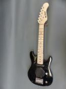 A child sized electric rhythm guitar by Blast with built in speaker,