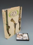 Petersen's 'Book of the Gun' together with a box of bullets and musket balls from American Civil