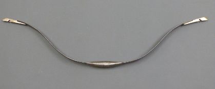 A middle Eastern Damascus steel bow inlaid with silver