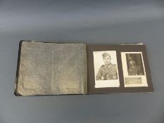 A WWII Nazi German photograph album including destroyed railway yards and lines, artillery,