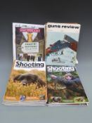 Fifty volumes of Guns Review and Shooting and Conservation magazines