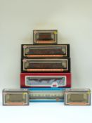 Seven Dapol and Airfix 00 gauge coaches and wagons,