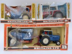 Three Britains model tractors Ford Tractor and Rear Dump 9630, Massey Ferguson 9522 and Ford 6600,