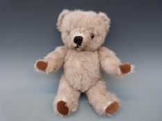 Three vintage teddy bears including a jointed mohair example,