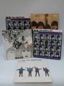 Five The Beatles albums all in stereo with black / silver with two in flipback sleeves,