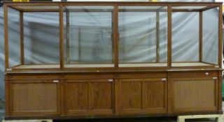 Ex Victoria & Albert Museum early 20thC mahogany four bay glass display cabinet with glazed upper