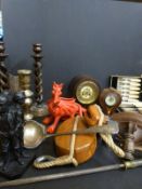 A pair of plated candlesticks, oak cased mantel clock, oak rope twist candlesticks, plated cutlery,