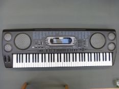 Casio WK-1600 six and a half octave electric keyboard and accessories