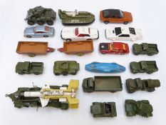 Nineteen Corgi, Dinky and similar diecast model vehicles including military tanks.