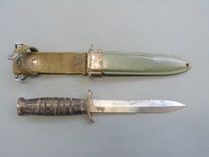 American WWII M3 US Marines fighting knife with 17cm blade, hilt marked US M-3 Utica,