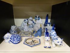 A collection of cat related ceramics