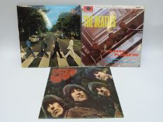 A case of albums of mixed genres including The Beatles (3),