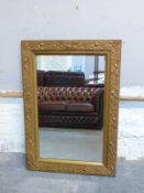 An Art Nouveau style gilt frame mirror,