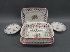 A hand decorated pierced chestnut basket and two matching side plates together with first period