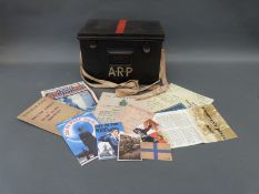 A metal ARP box with canvas strap