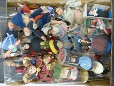 A large collection of dolls of the world together with a Norah Wellings felt doll and a miniature