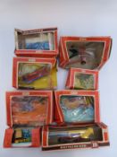 Eight Britains model farm implements and vehicles including Disc Harrow, Seed Drill, Ploughs,