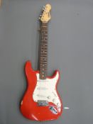 Falcon electric rhythm guitar in red finish with soft carry case