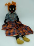 A vintage boudoir doll in period costume