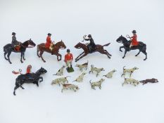 Seventeen Britains or similar lead hunting figures and animals including fox and hounds etc