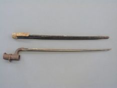 Martini Henry type bayonet with leather scabbard,