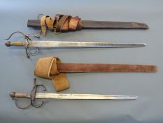 A pair of replica English Civil War swords with leather scabbards and belts,