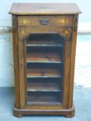 A 19thC walnut inlaid music cabinet with single drawer and glazed cupboard,